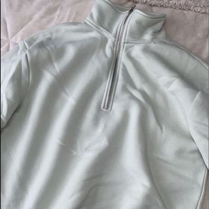 QUARTER ZIP